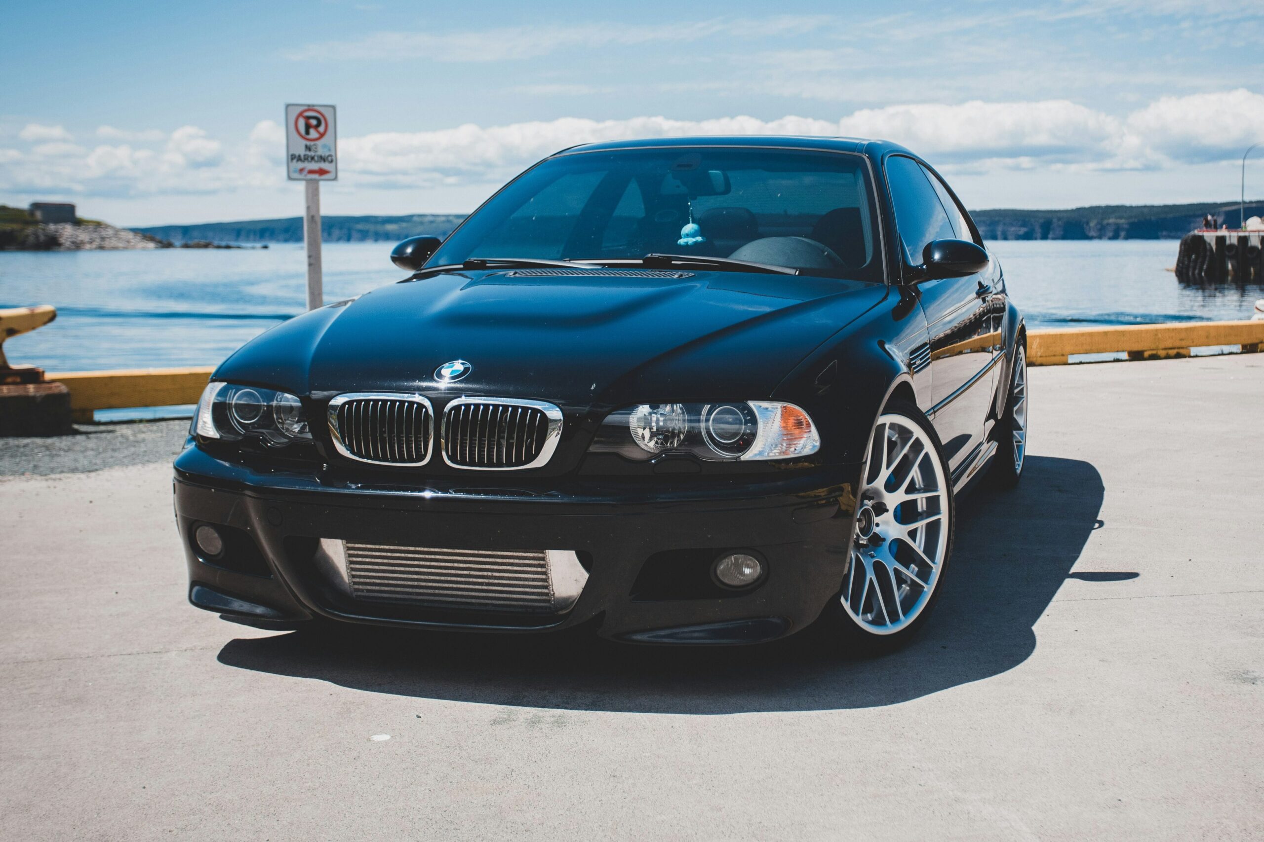 A front-end view of a black E46 BMW M3