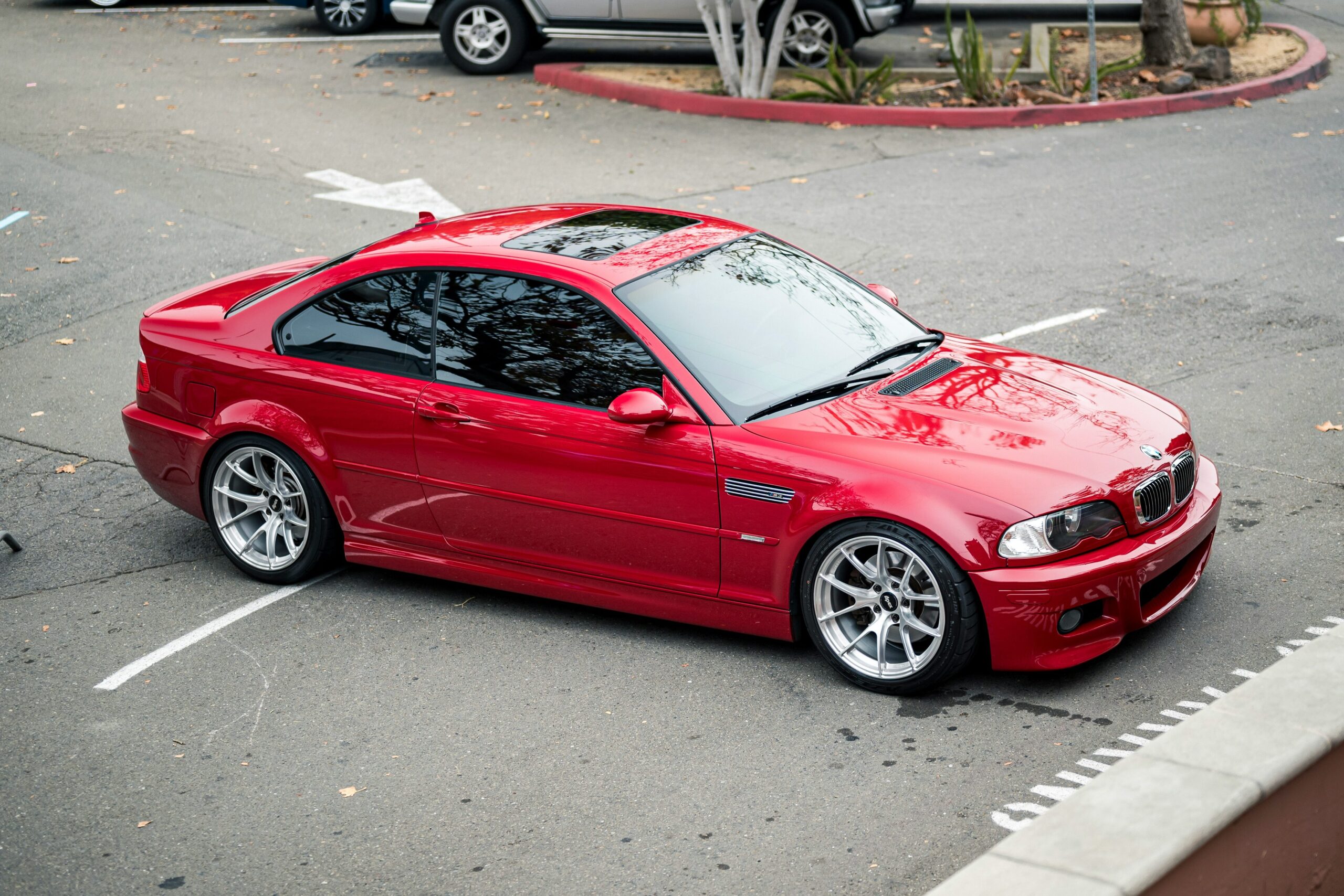 An aerial view of a red BMW E46 M3.