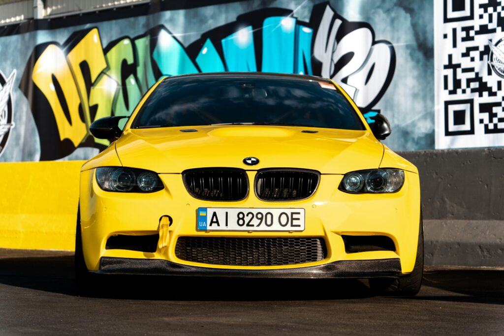 Front-end view of a yellow BMW E92 M3.
