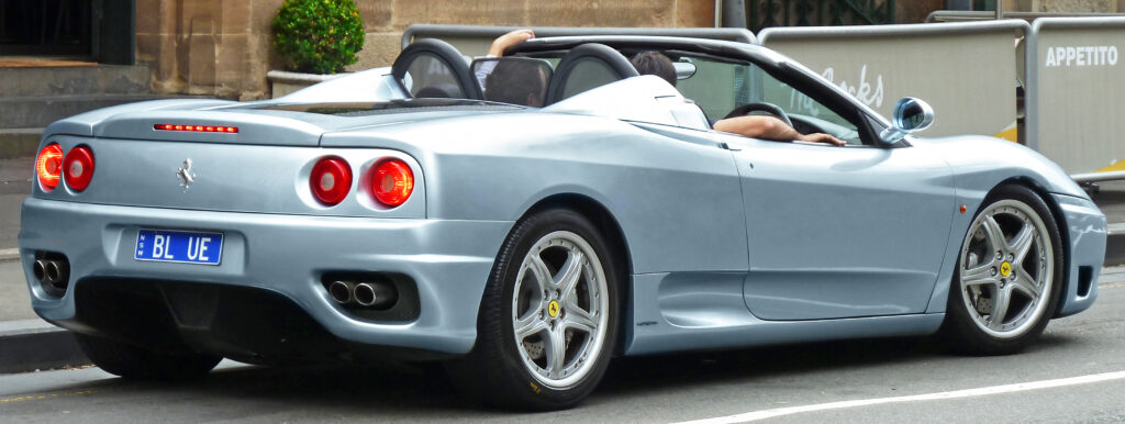 Rear end shot of a silver Ferrari 360 Spider