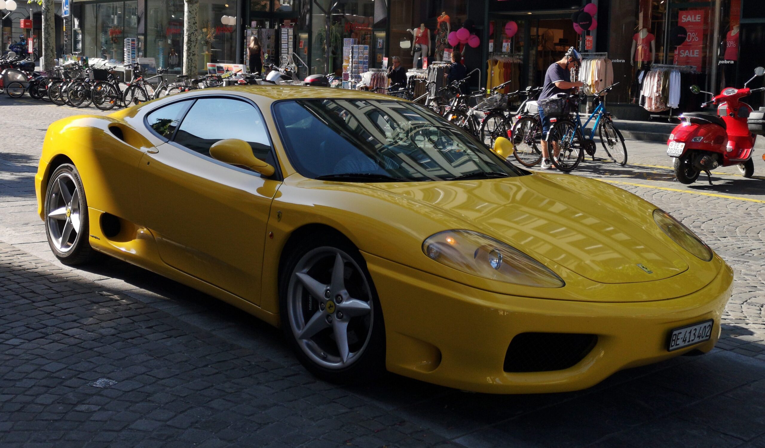 A front end shot of a yellow Ferrari 360