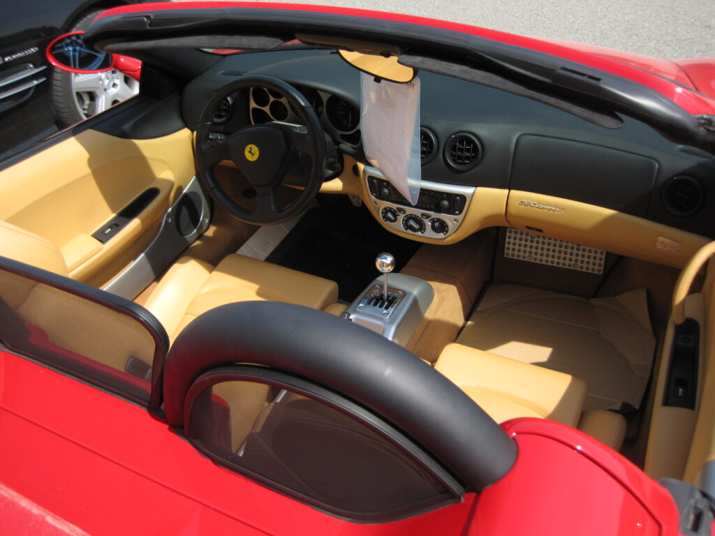 Interior view of a red Ferrari 360 Spider