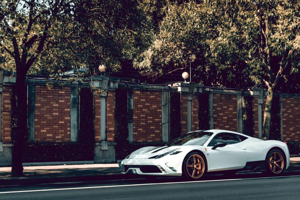 A white Ferrari 458 Speciale parked.