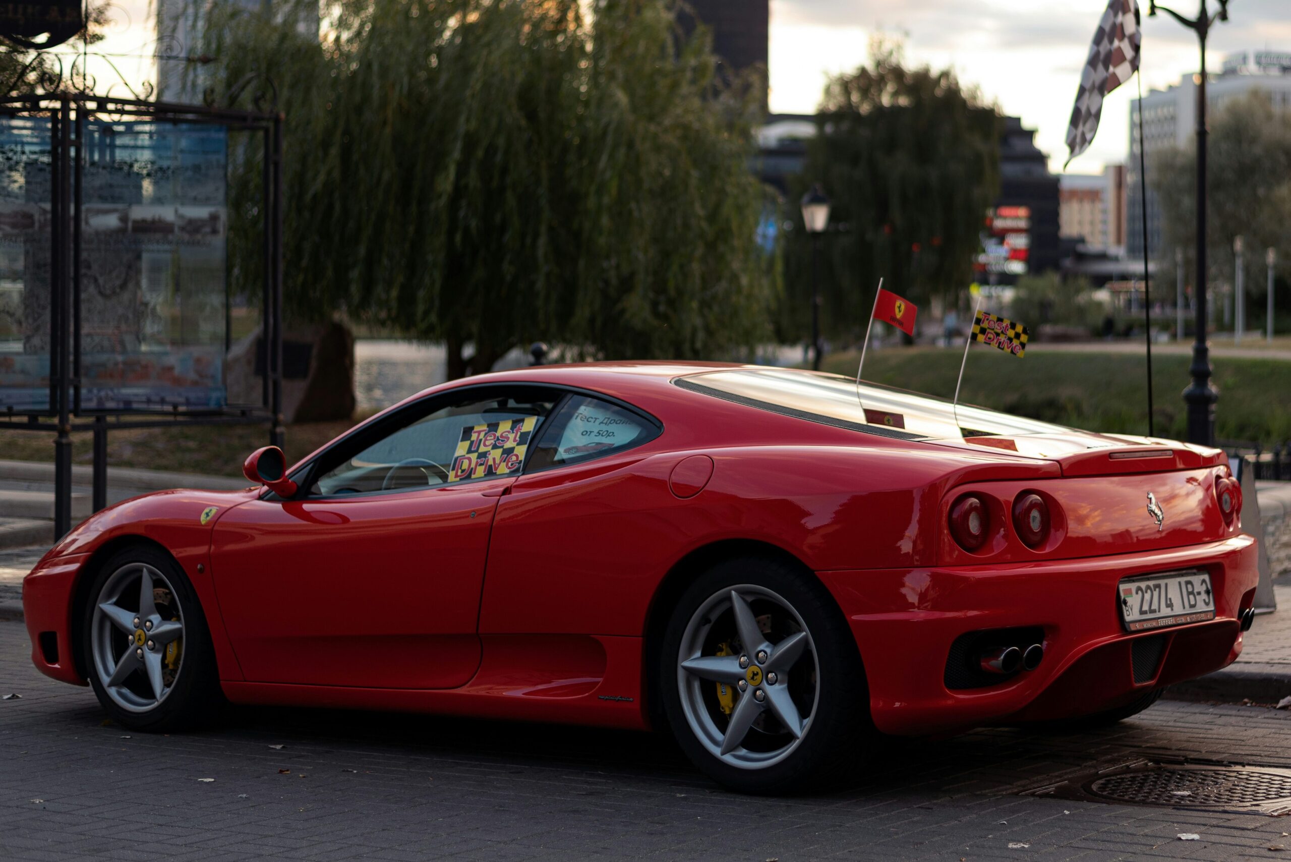 A three-quarter view of a red Ferrari 360