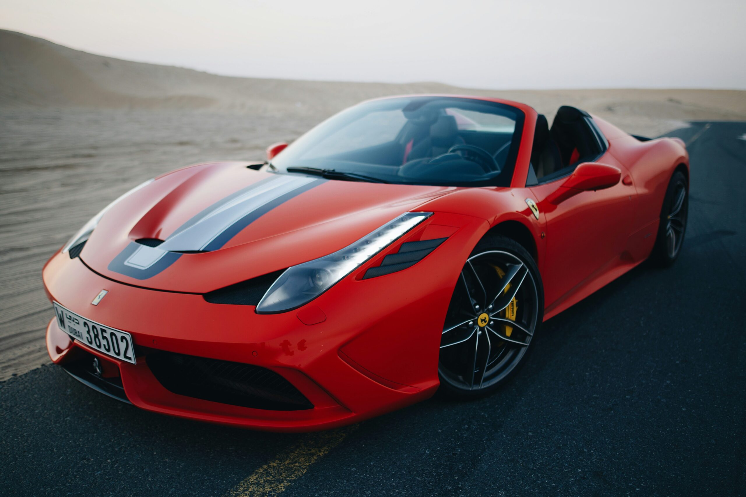 A red Ferrari 458 Speciale parked